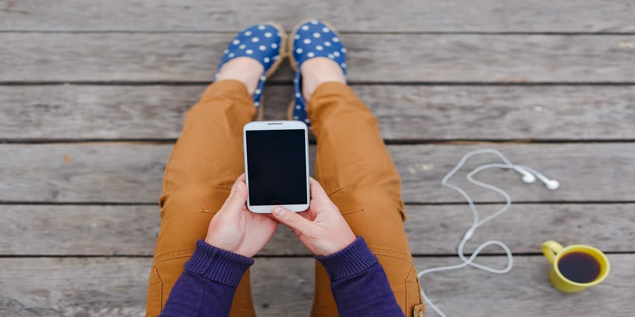 woman looking at phone